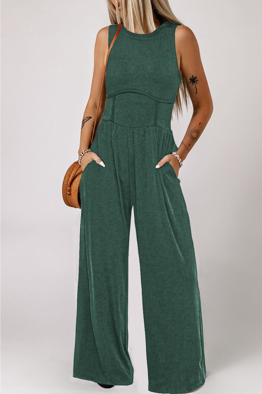 Dark green cinched waist sleeveless wide leg jumpsuit